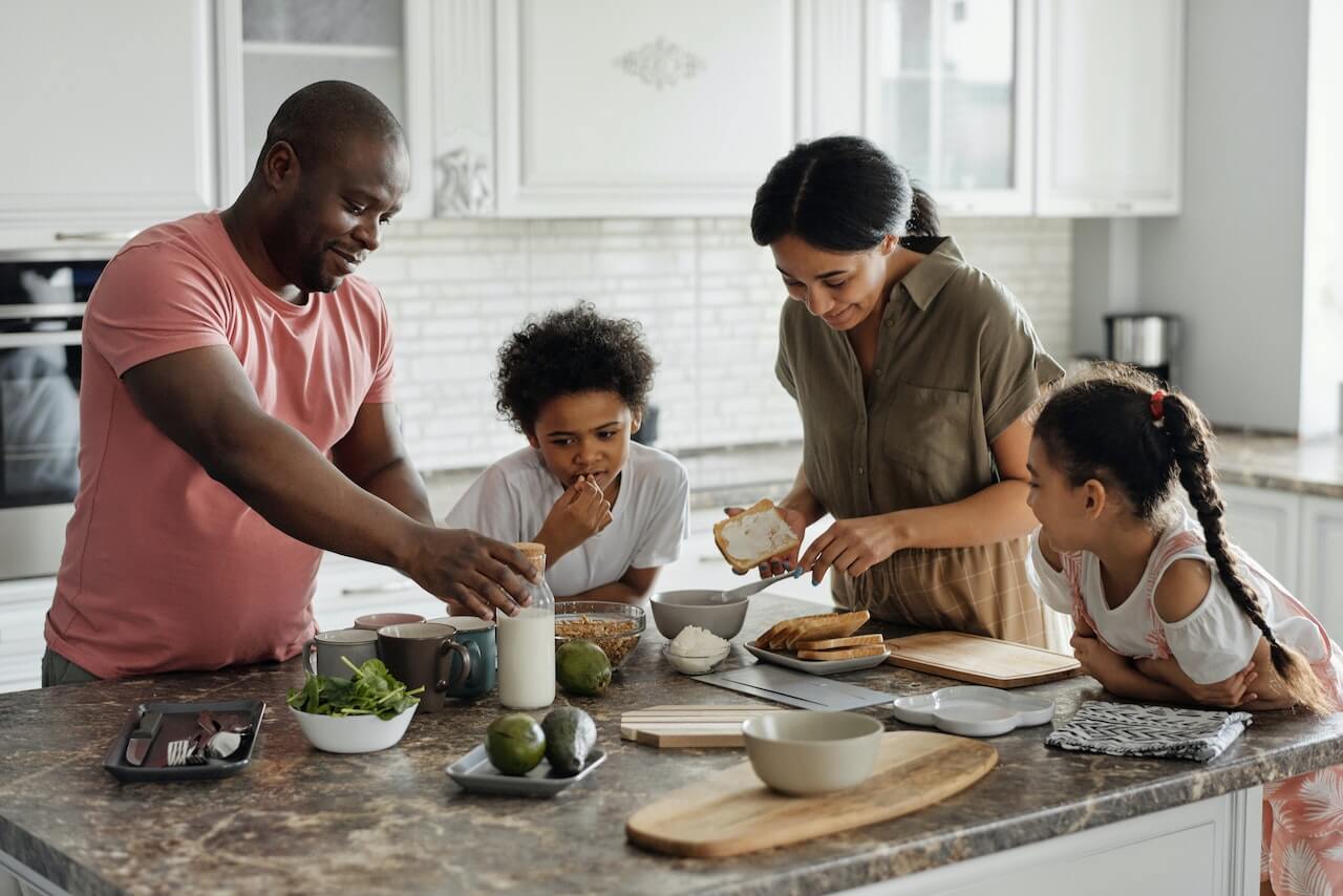 Family-Making-Breakfast-in-the-Kitchen