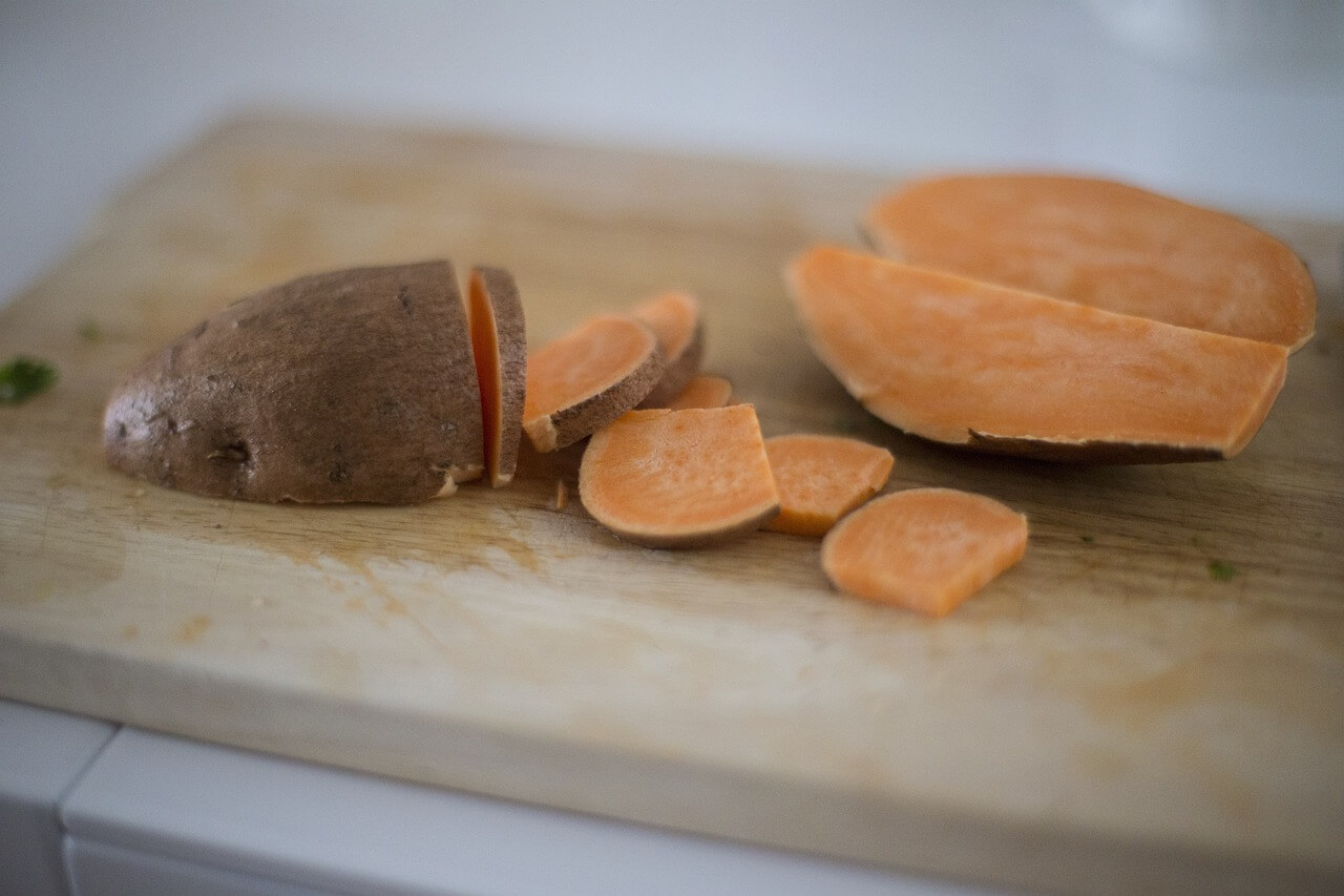 raw-sweet-potato-cut-on-wood-chopping-board