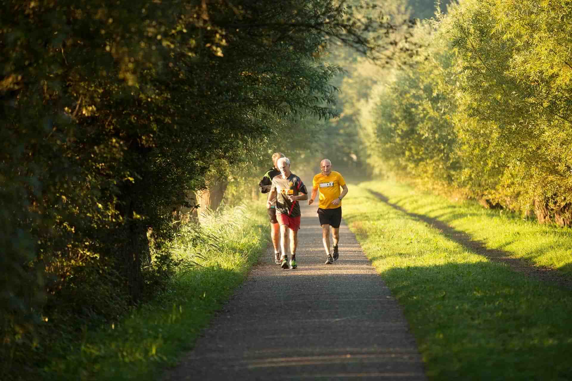 Group-of-elderly-men-running-to-keep-themselves-physically-active-foods-that-help-with-bloating