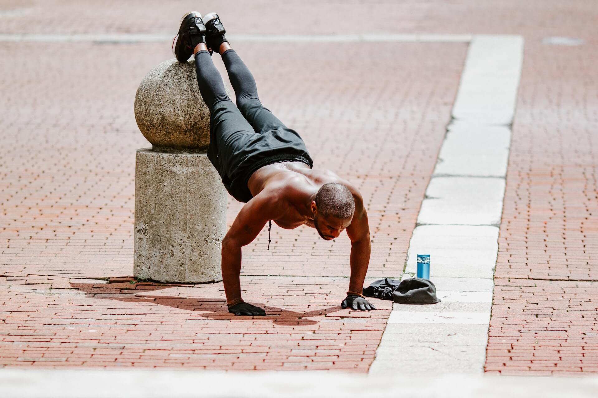 man-doing-push-ups-on-the-street