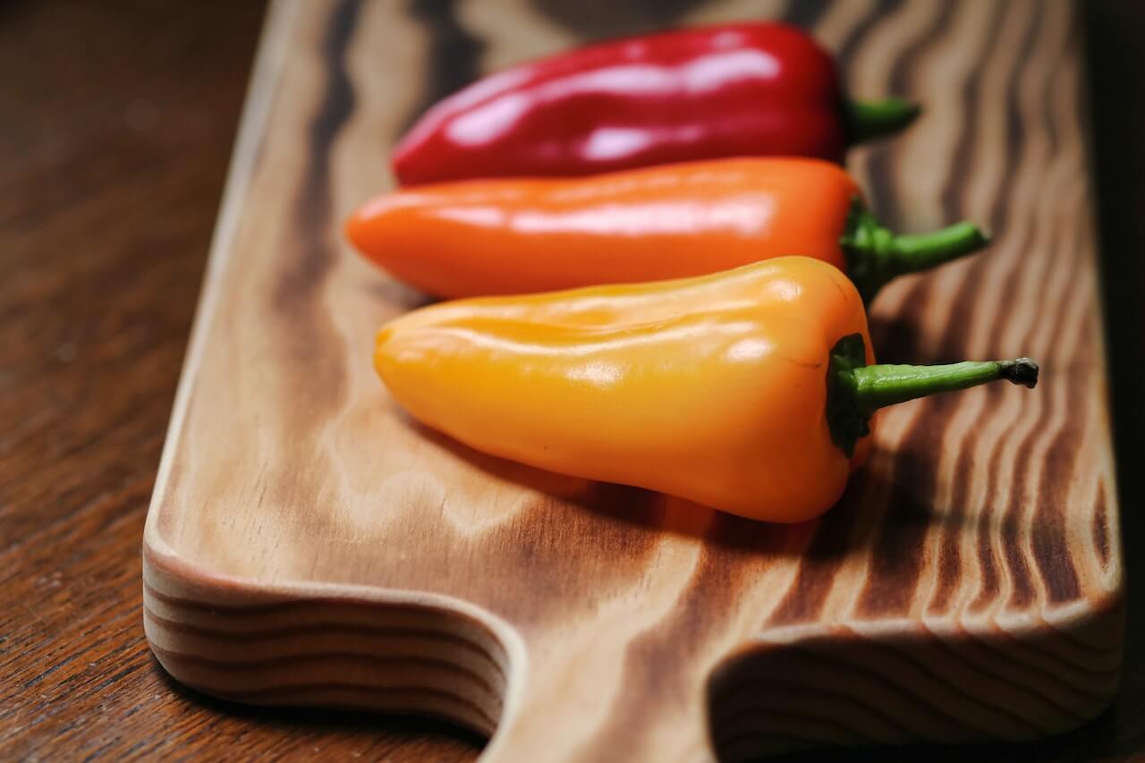 Three-peppers-on-cutting-board