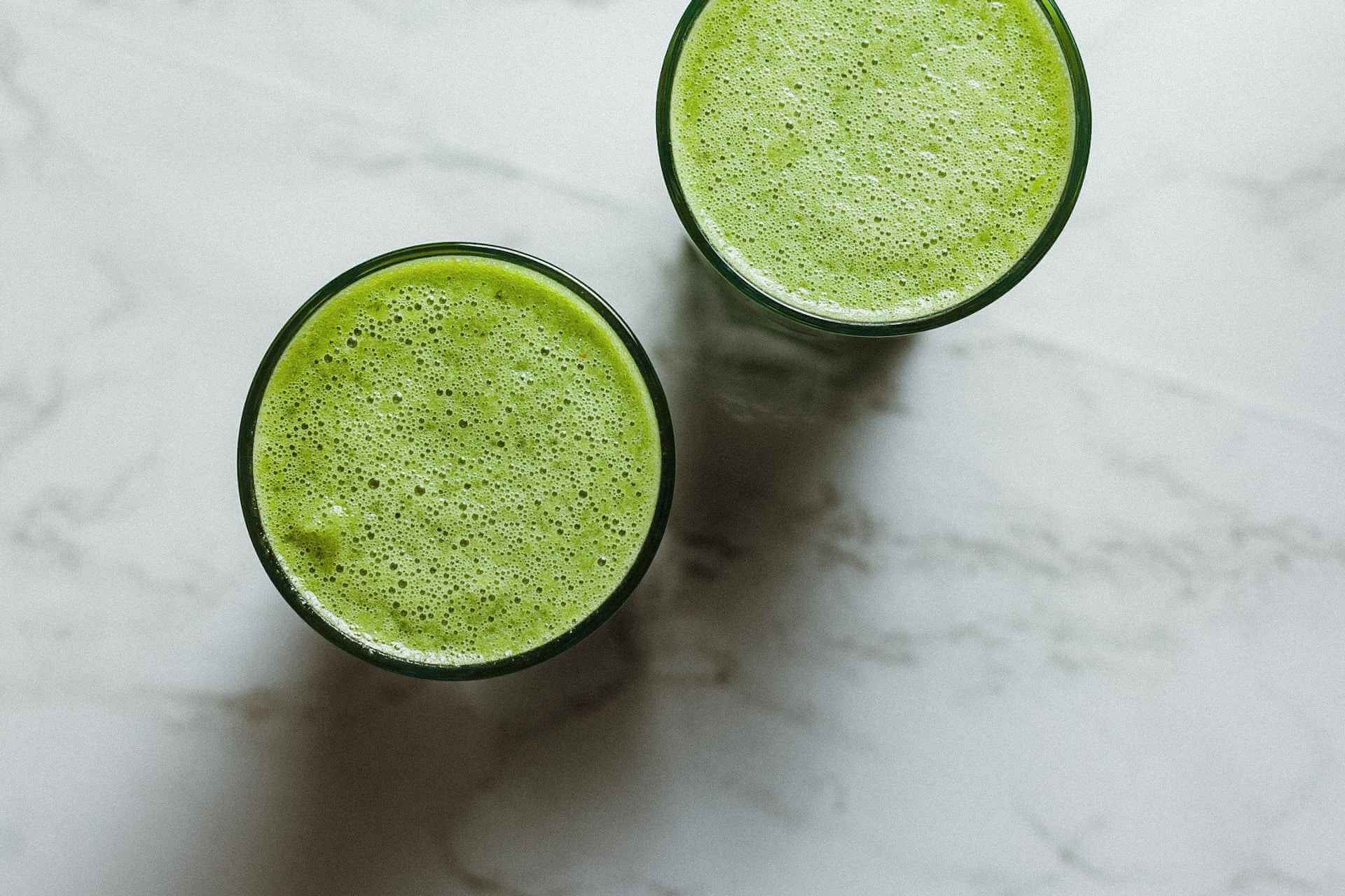 Two-glasses-of-celery-juice-from-top-view