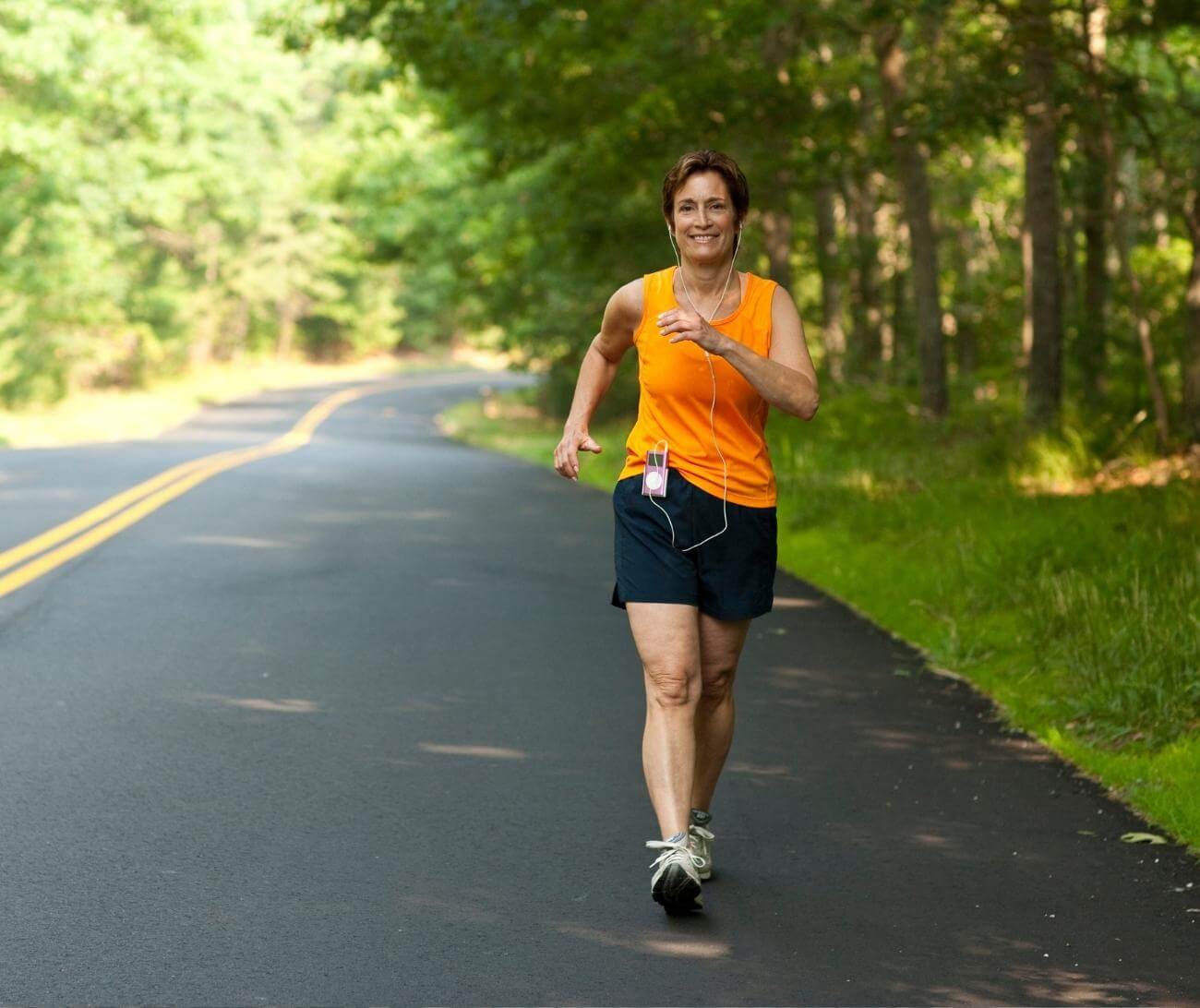 Woman speed walking on a calm street